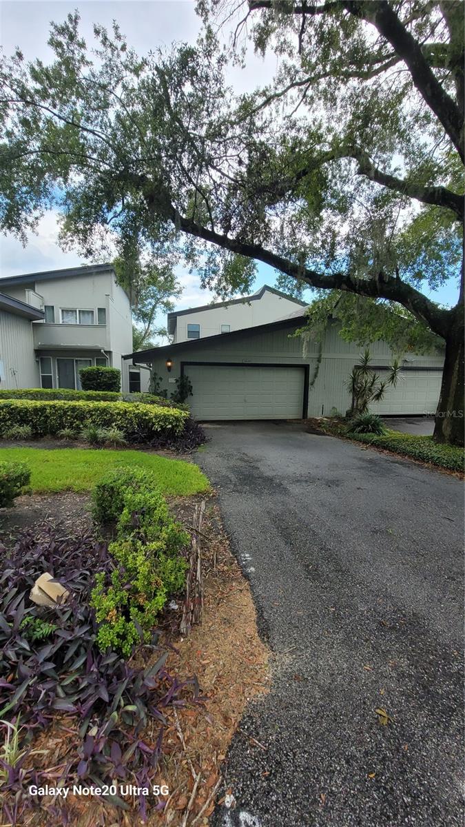 Spacious 3/2 condo with 2 car garage located in Errol Golf & Country Club Estates. Huge master suite upstairs with balcony, walk-in closet, dressing area, and full bath. 2 bedrooms with roomy closets downstairs share the first floor bath. Large eat-in kitchen with tiled countertops and wood floors, combo living/dining room have laminate floors, sliding glass doors to the enclosed deck. Offered with easy move in terms - first month rent plus one month as security. Call today to schedule a viewing.