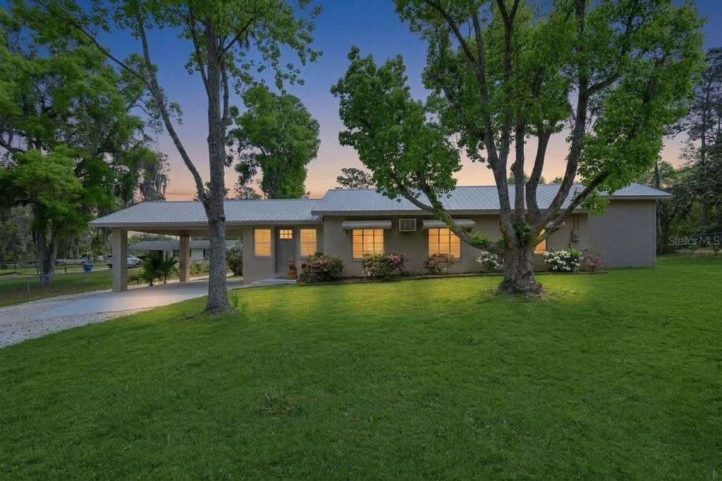 Photo of 4611 Grand Avenue, De Leon Springs, FL 32130 (MLS # V4947922)