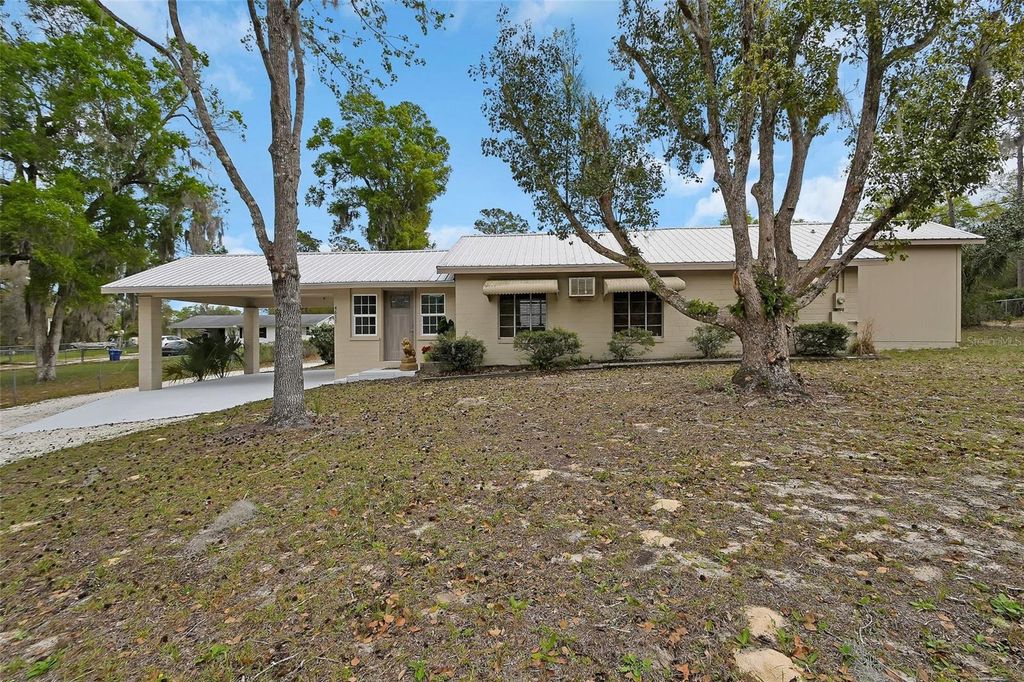 Photo of 4611 Grand Avenue, De Leon Springs, FL 32130 (MLS # V4947922)