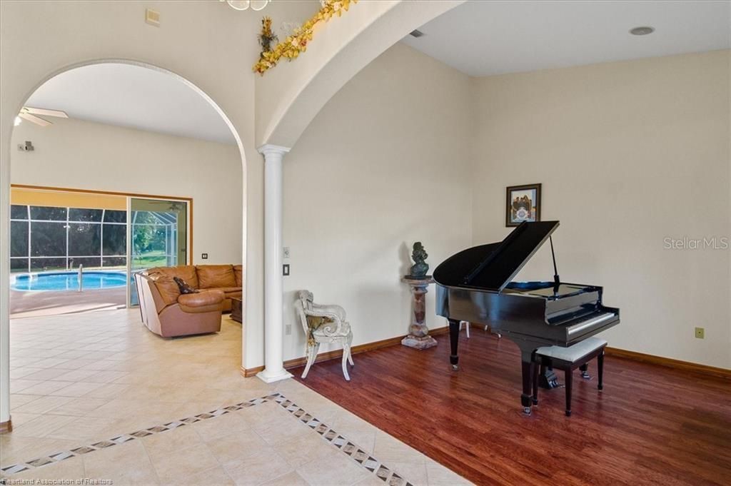 Photo of 631 Sunset Pointe Drive, Lake Placid, FL 33852 (MLS # L4957464)