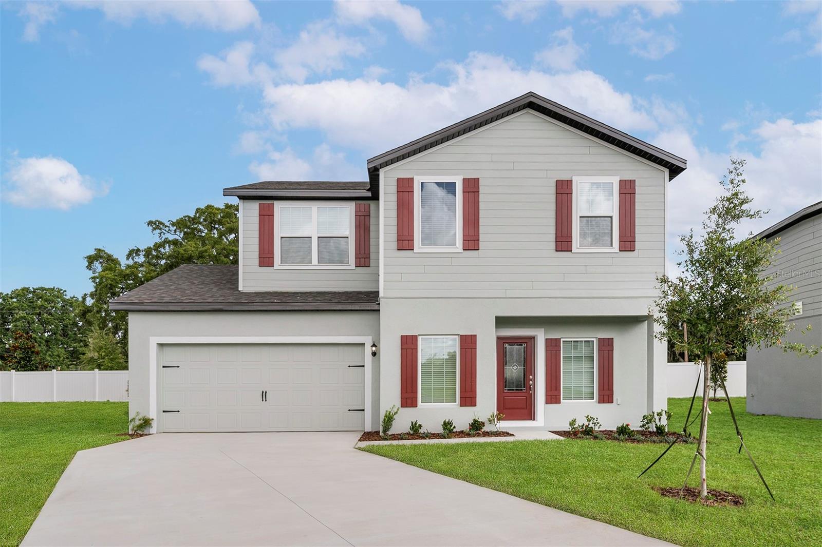 Welcome to the Benton model in the beautiful brand-new Tula Parc community of Astatula! This stunning two-story home offers 3 bedrooms, 2.5 bathrooms, and a spacious, open-concept design perfect for modern living.
The first level is designed for entertaining, featuring a chef-inspired kitchen with granite countertops, brand-new Whirlpool® appliances, and a spacious family room that flows seamlessly for gatherings. A formal dining room, set apart from the main living area, provides the perfect space for hosting meals and special occasions.
Upstairs, you’ll find all three generously sized bedrooms, including a private master retreat with a large walk-in closet and an expansive en-suite bathroom. The master bath offers ample vanity space and a wide layout, making mornings effortless.
Outside, enjoy the mature landscaping in the front yard and the convenience of a spacious garage. Living in Tula Parc means access to wonderful community amenities like a gazebo and playground, plus proximity to Little Lake Harris, where you can enjoy boating, fishing, and kayaking. With parks, nature reserves, golf courses, and Orlando’s top attractions just a short drive away, this home truly offers the best of Florida living.
Don’t miss the chance to make this stunning Benton model yours—schedule a showing today!