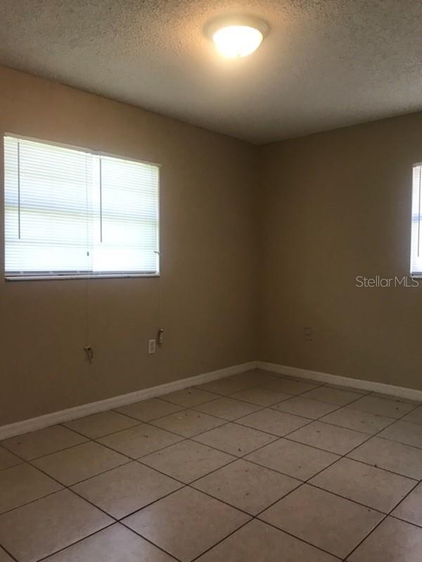 Photo of 1439 S Oxalis Avenue, Orlando, FL 32807 (MLS # O6452128)