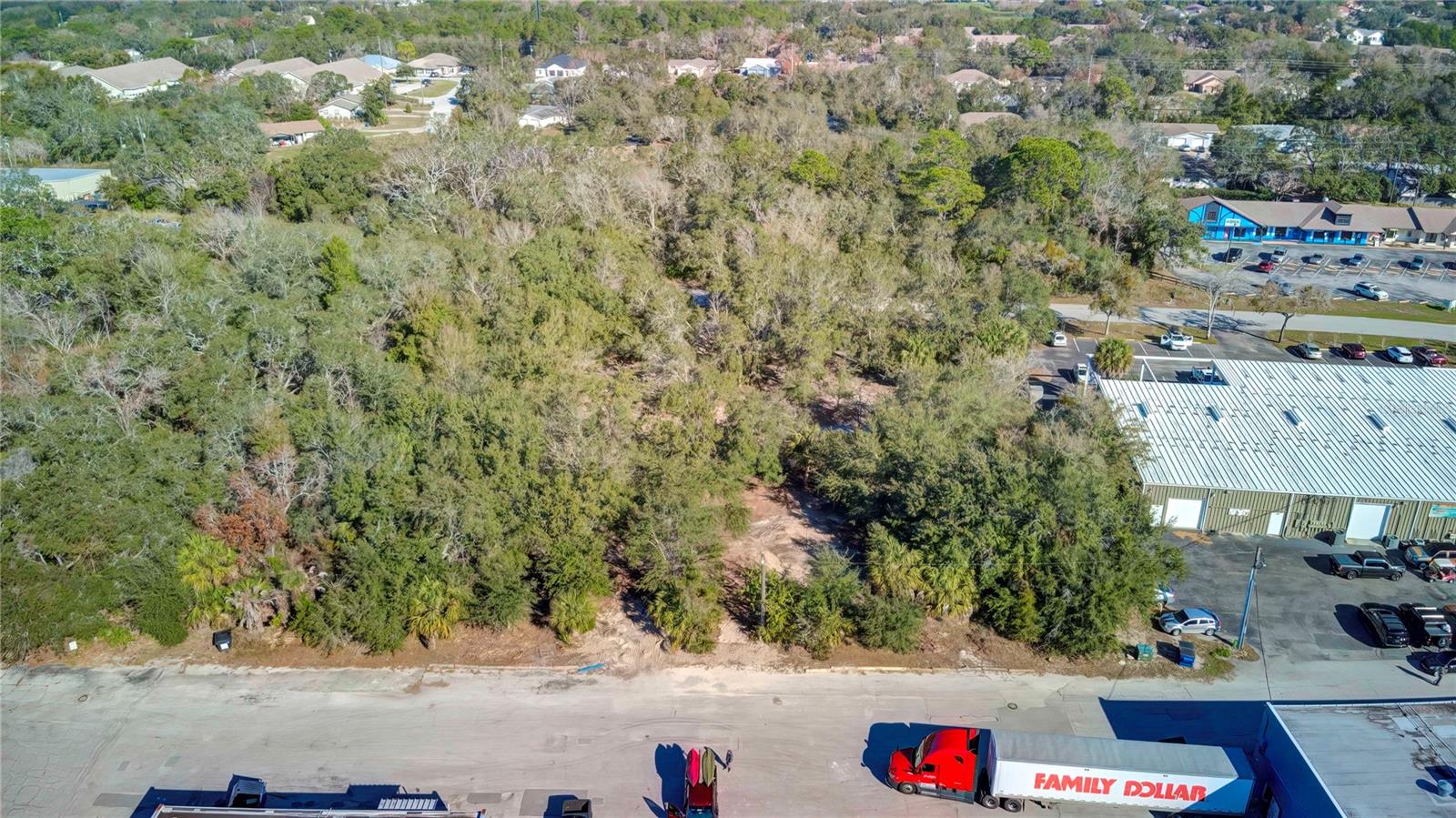 Great Commercial parcel of vacant land in the heart of Spring Hill! 1.17 Acres of Commercial Vacant Land. This lot has been mostly cleared. Located behind Spring Hill Plaza off Kass Circle.
