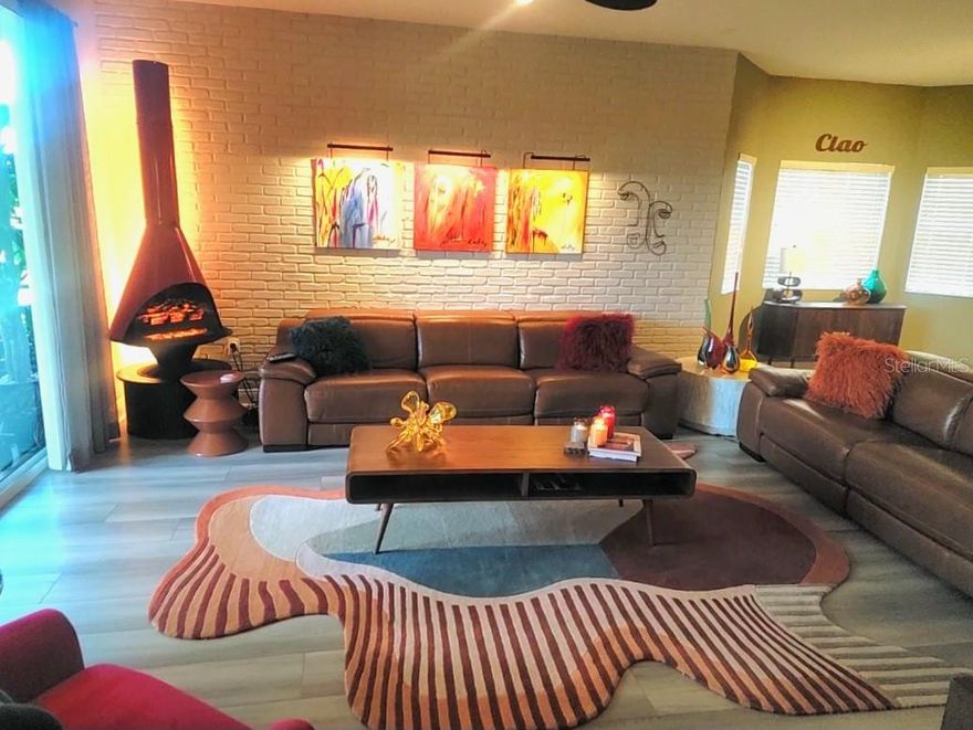 One or more photo(s) has been virtually staged. Stop Scrolling – This is the One!
Welcome to your private oasis in the Fabulous Seminole Isle Condominium community — a gated resort-style enclave surrounded by lush nature and just minutes from the Gulf beaches.
This 2nd-floor corner unit features 3 bedrooms, 2 baths, and inside laundry, with under-building parking conveniently located just steps away. Take the elevator or the easy stairs right to your front door. 
High Speed Internet and Cable INCLUDED, along with water included as well.
Step inside and you’ll immediately notice the thoughtful upgrades and character throughout. The beautiful kitchen showcases quartz counters, custom cabinetry, deep sink, and an eat-in area with built-in desk and pantry. The spacious living room includes a feature brick wall, and plenty of natural light.
The primary suite offers a spa-like ensuite bath with dual vanities, soaking tub, and walk-in shower. The additional bedrooms are generous in size and share a second full bath.
One of the most unique features of this condo is the hidden room. Enjoy your screened balcony surrounded by greenery, complete with a brick accent wall that adds charm and privacy. Condo is NOT furnished.
Resort-style amenities include a clubhouse, fitness center, heated pool, tennis and pickleball courts, fishing dock, and kayak launch to the Bayou. Enjoy the walking trail, picnic pavilions, and fire pit, or head across the avenue to Seminole Lake Park with biking trails, playground, and boat ramp. Just a short drive to Seminole City Center for shopping and dining, and 10 minutes to the Gulf beaches.