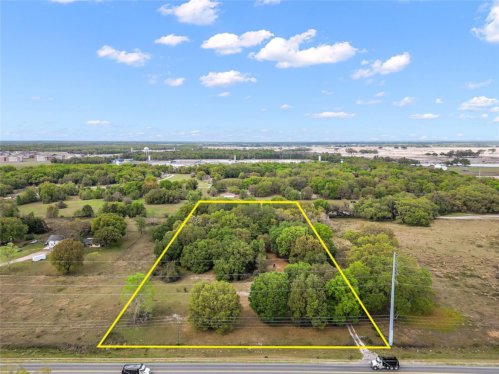 Offering is for 5+/- Acres on CR 470 and directly across from The Villages newest development Middleton including The Villages new charter schools. The Villages newest development is a non age restricted development to help alleviate the shortage of workforce housing for Village employees, contractors and their family's. The Middleton Neighborhood CDD will include 2,480+/- acres with a mix of 8,280+/- homes for single family's to multi family rentals as well as retail, commercial and professional office in phase I. VALUE is in the land. The offering structures can be viewed during due diligence. This is a great opportunity to buy and hold or future potential development. Survey & Phase I avalible. All information is believed correct and accurate but not guaranteed or warranted and subject to change without notice. Do not enter property without an appointment. Entering property with no appointment is trespassing.