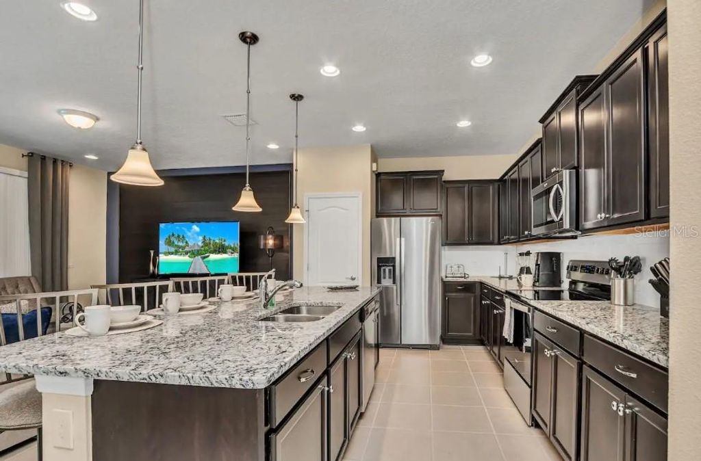 Photo of 2407 Dubai Street, Kissimmee, FL 34747 (MLS # O6398836)