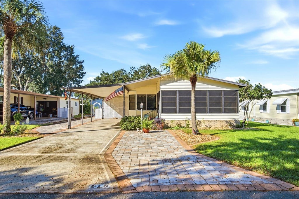 Photo of 113 Jackson Park Avenue, Davenport, FL 33897 (MLS # O6449120)