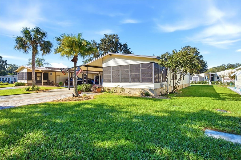 Photo of 113 Jackson Park Avenue, Davenport, FL 33897 (MLS # O6449120)