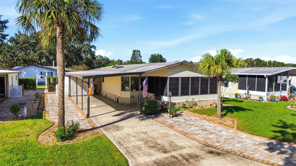 Photo of 113 Jackson Park Avenue, Davenport, FL 33897 (MLS # O6449120)
