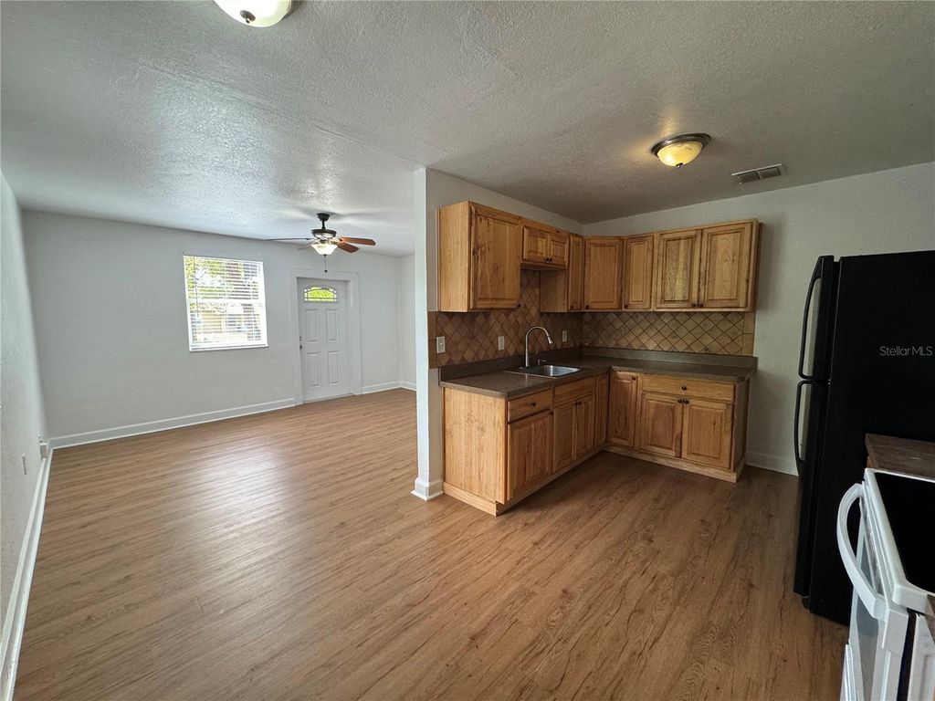 Photo of 5315 Davisson Avenue, Orlando, FL 32810 (MLS # O6397344)