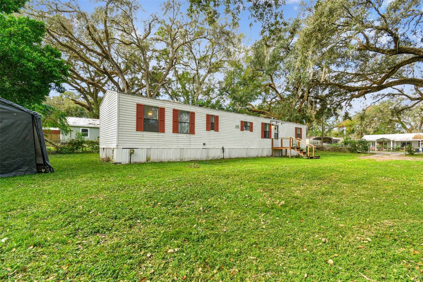 Short Sale. SHORT SALE OPPORTUNITY !!!! Calling all first-time homebuyers, DIY enthusiasts, and savvy investors—this is your chance to own a charming slice of country living with incredible potential! Welcome to this 2-bedroom, 2-bathroom home nestled on a generous ¼-acre lot in peaceful Dade City. Built in 1995, this spacious split floor plan home offers solid bones and major updates already in place, including: New Roof (2018); Updated Electrical Panel (2016) ; AC System (2016) . All that's left is your personal touch and vision! With a little TLC, you can transform this home into your very own mini homestead or retreat. Picture this: planting fruit trees, harvesting your own vegetables, raising chickens, or even parking your RV, boat, or other toys—no HOA, no deed restrictions, and total freedom to create your dream lifestyle.
Tucked away in a high, dry, and secluded neighborhood, yet just minutes from shopping, dining, and major roadways, you get the best of both worlds—quiet living with everyday convenience. This property is move-in ready, FHA and VA loan approved, and the perfect opportunity to start living in your very own home. Whether you're looking to put down roots or invest in your future, this is the one you've been waiting for. Schedule your private showing today and let's bring your vision to life!