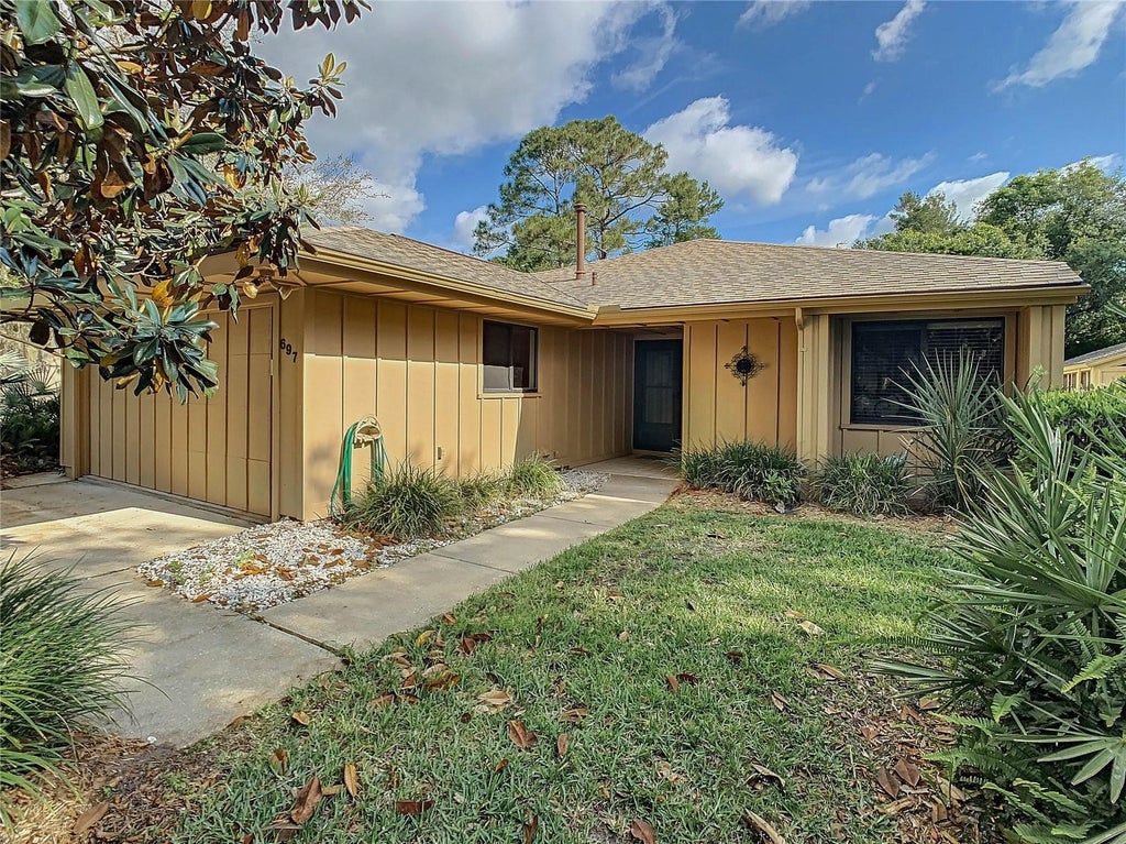 Photo of 697 Saint Andrews Circle, New Smyrna Beach, FL 32168 (MLS # NS1089561)