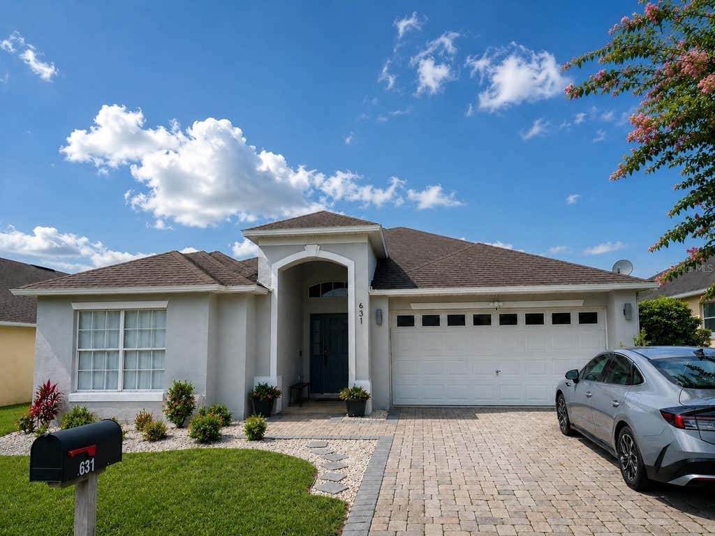 Photo of 631 Old Bridge Circle, Davenport, FL 33897 (MLS # O6435863)