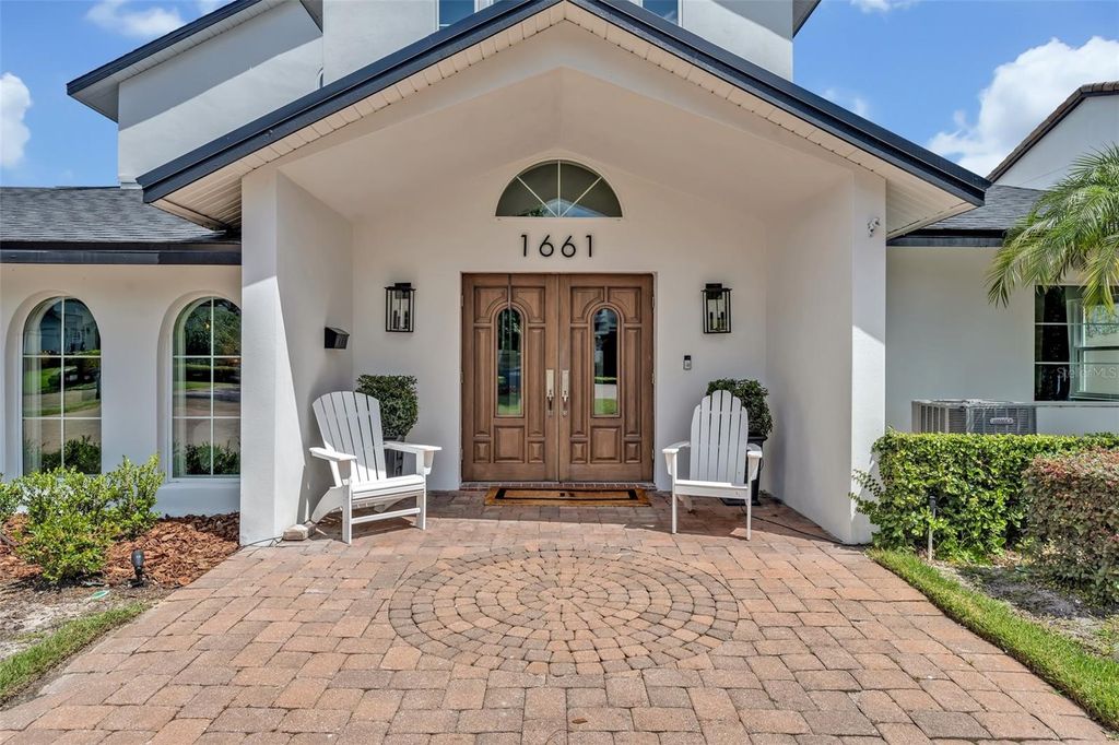 Photo of 1661 Woodland Avenue, Winter Park, FL 32789 (MLS # O6399348)