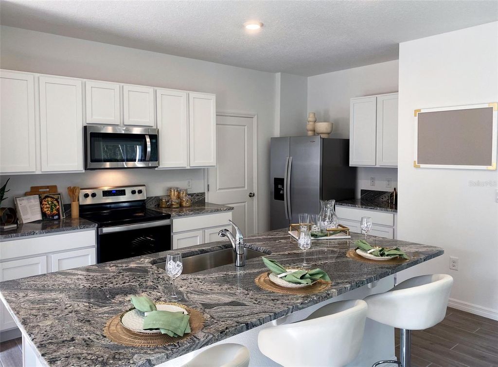 Photo of 4679 SW 51st Drive, Gainesville, FL 32608 (MLS # OM717025)