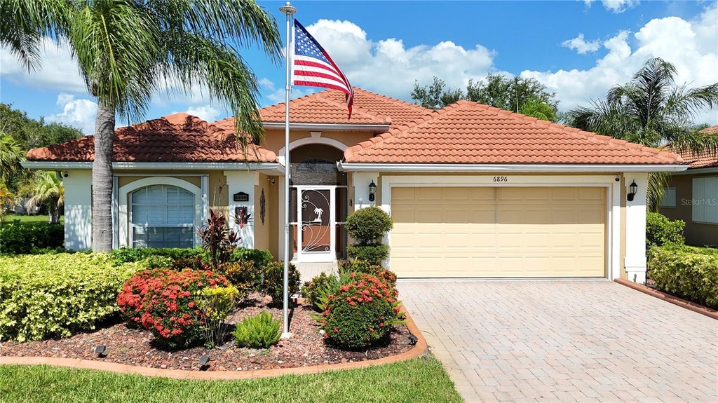 Photo of 6896 Talon Bay Drive, North Port, FL 34287 (MLS # C7529587)