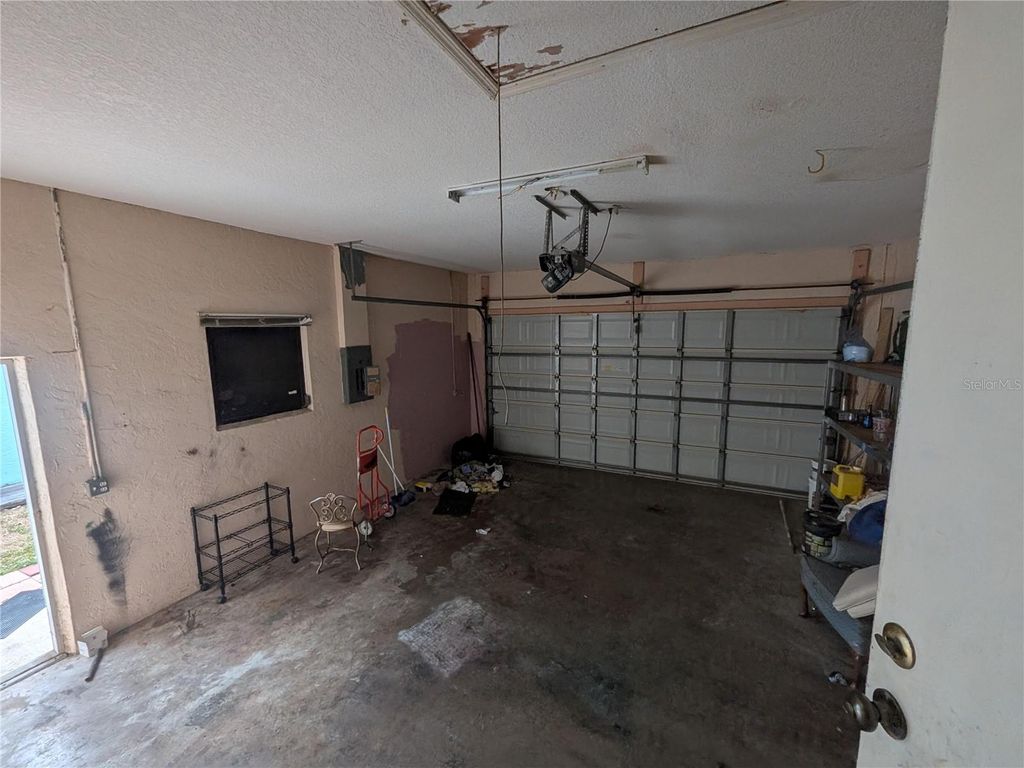 Photo of 110 Peckham Street SW, Port Charlotte, FL 33952 (MLS # O6369175)