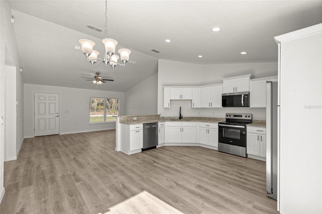 Photo of 24698 NW Sutton Avenue, Dunnellon, FL 34431 (MLS # OM714842)