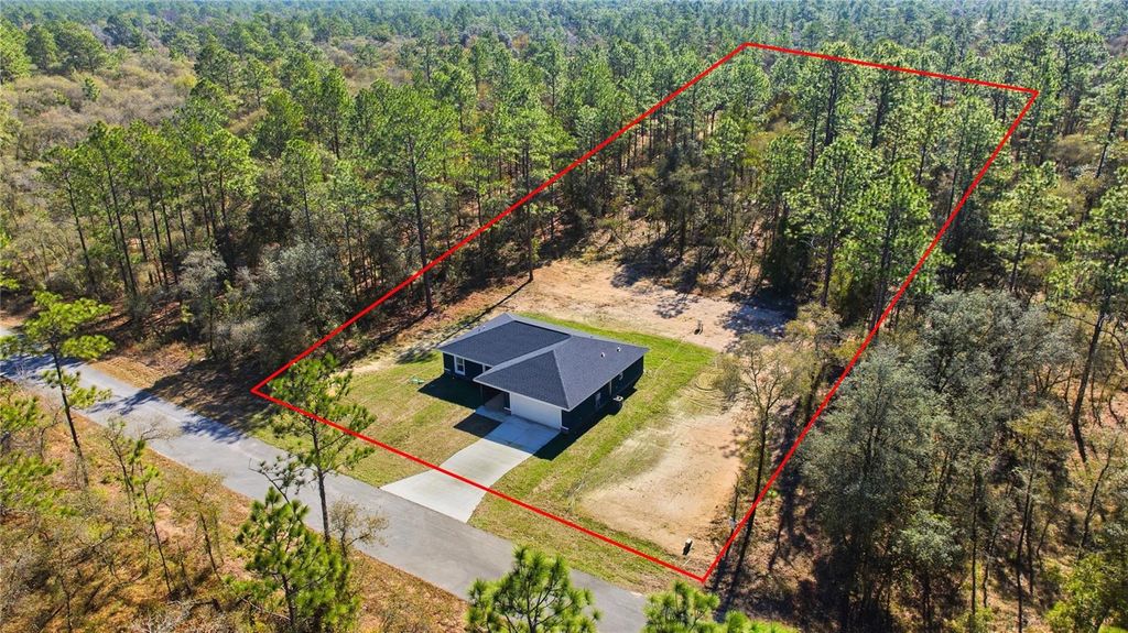 Photo of 24698 NW Sutton Avenue, Dunnellon, FL 34431 (MLS # OM714842)