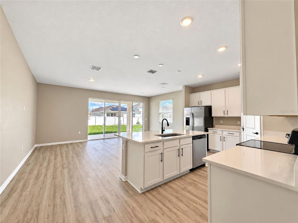 Photo of 819 Folklore Lane, Haines City, FL 33844 (MLS # O6442416)