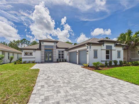 Photo of 230 S Riverwalk Drive, Palm Coast, FL 32137 (MLS # FC319416)