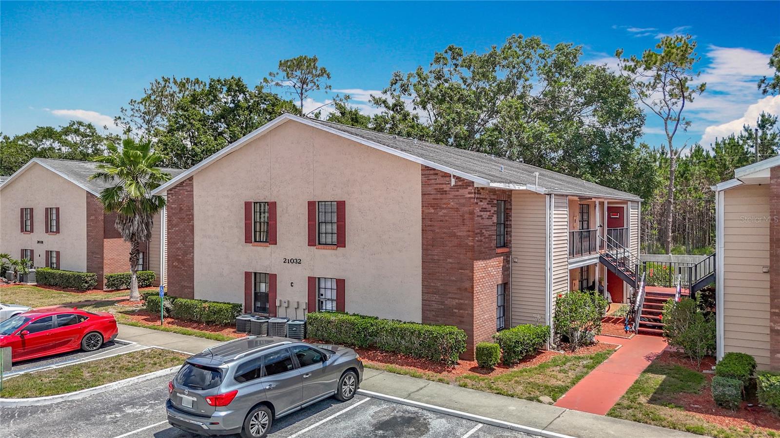 Affordable and Move in ready. This lovely Gem has been updated and recently refreshed with new paint and flooring to go with the already upgraded kitchen and bath. Neutral colors and modern finishes make this an appealing option. Why rent when you can own for less! As you walk into this cute condo, you'll notice the open floor plan, Large Great Room and easy to maintain Laminate flooring flows throughout the main living areas and bedrooms. The kitchen and baths have matching modern Luxury Vinyl Plank flooring. The kitchen offers ample cabinet space with breakfast bar and small eat in area. Updated bathroom has bath/tub combo with newer tile surround and Vanity. No carpet in this low maintenance Beauty. The community offers a Pool and Clubhouse and is located in the heart of Land O Lakes easy access to 41 and SR 54 and Suncoast expressway. Short drive to shopping, dining and more. Monthly rent covers water, sewer, trash, & exterior maintenance. Perfect for traveling nurses affordable and convenient to everything. Up to 2 Small pets allowed with pet fee.