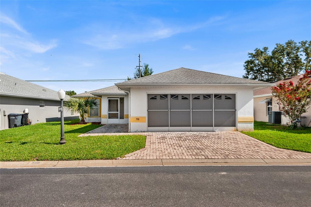Photo of 596 Sweetwater Way, Haines City, FL 33844 (MLS # L4964835)