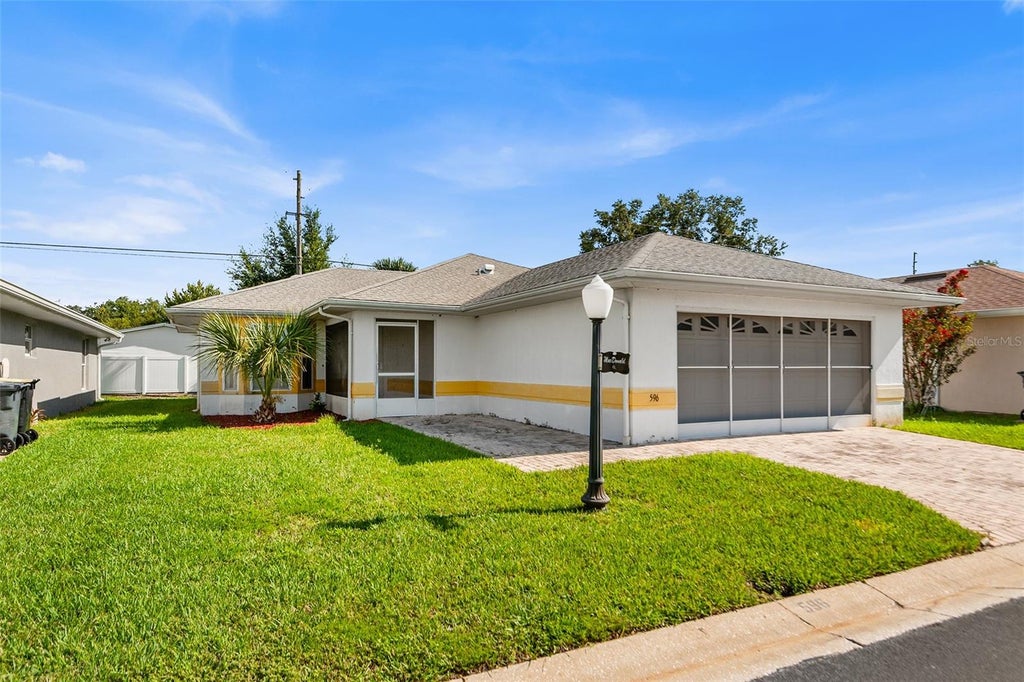 Photo of 596 Sweetwater Way, Haines City, FL 33844 (MLS # L4964835)