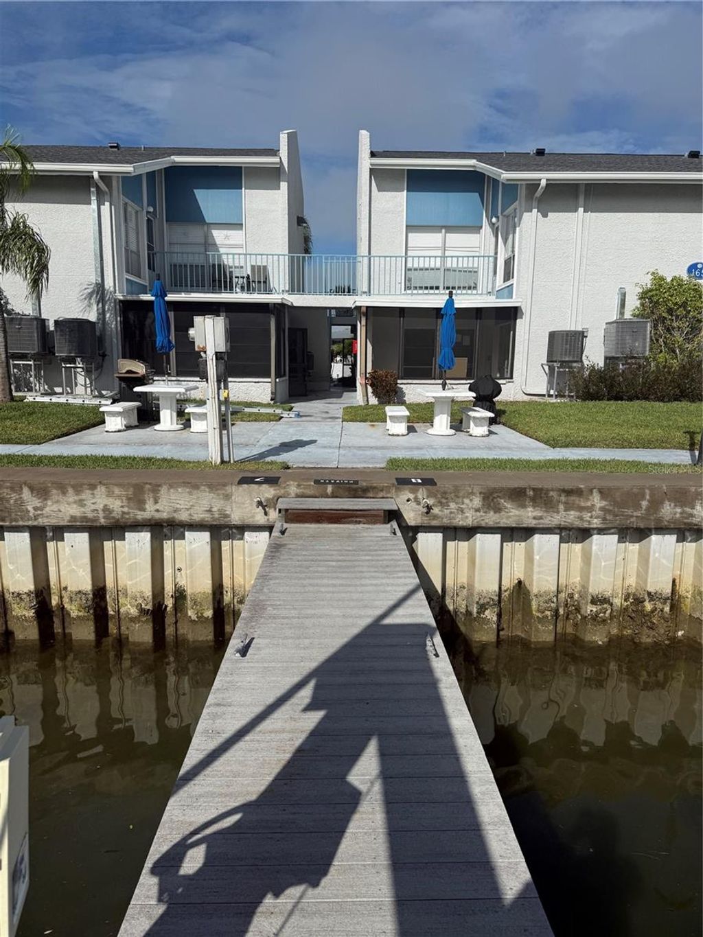 Photo of 165 Medallion Boulevard #C, Madeira Beach, FL 33708 (MLS # TB8453641)