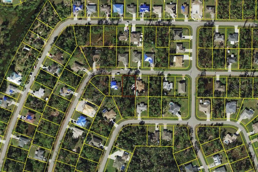 Beautiful lot waiting for you to build your dream home in the thriving city of North Port, home of the Atlanta Braves Spring Training. Minutes to the North Port Aquatic Center, the water park that features a 25-meter stretch pool, three slides, and a lazy river. Centrally located to EVERYTHING...US-41, I-75, schools, Suncoast Technical College, Shannon Staub Library, and plenty of grocery & retail shopping, and dining. Close to Venice, Port Charlotte & Punta Gorda. Near the new waterfront oasis, Sunseeker Resorts. Convenient access to a multitude of golf courses, world-class fishing, boating, and stunning Gulf beaches!