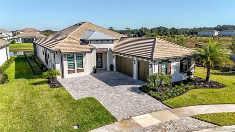 Photo of 34135 Tompion Way, Wesley Chapel, FL 33543 (MLS # TB8444070)