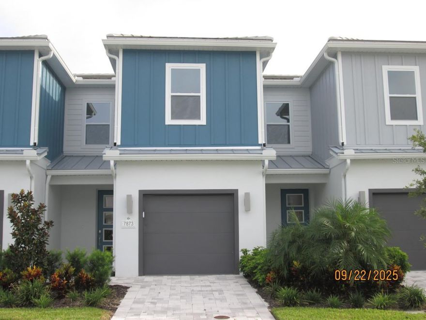New Construction, don't miss out on reduce pricing! Exceptional Location across from the Reunion Waterpark inside exclusive Reunion Guard-Gated Community. Beautiful open floorplan with natural light throughout the home. The open floorplan has a spacious living area, kitchen, living and dining areas have porcelain tile and vinyl planking flooring on 2nd floor stairs and hallway. Upstairs, all three bedrooms provide comfort with a conveniently located laundry room. This home is unfurnished. The residents enjoy access to an unparalleled lineup of world-class amenities, including three Championship golf courses, Jack Nicklaus, Arnold Palmer and and Watson, a fitness center, a 5 acre water park, lazy river with 7 swimming pools, a tennis center, mini golf, pickleball courts, and many choices of on-site restaurants. Residents enjoy their private Spectrum Clubhouse and Resort Pool. Just 10 minutes from Disney Parks and 20 minutes from Universal Studios, this home offers an unbeatable central location with easy access to major highways like I-4, 417, and 429. Flexible terms: primary residence, long-term rental, or a short-term vacation rental