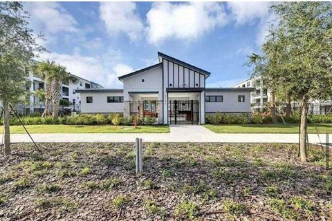 Photo of 3120 Paradox Circle #304, Kissimmee, FL 34746 (MLS # O6260372)