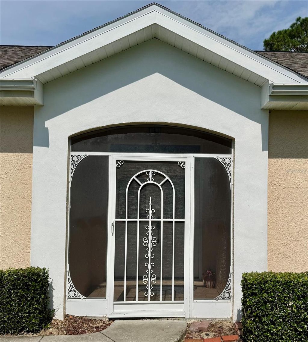 Photo of 5688 Legend Hills Lane, Spring Hill, FL 34609 (MLS # A4665384)
