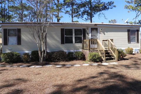 Photo of 2090 SE 133rd Court, Morriston, FL 32668 (MLS # OM716114)