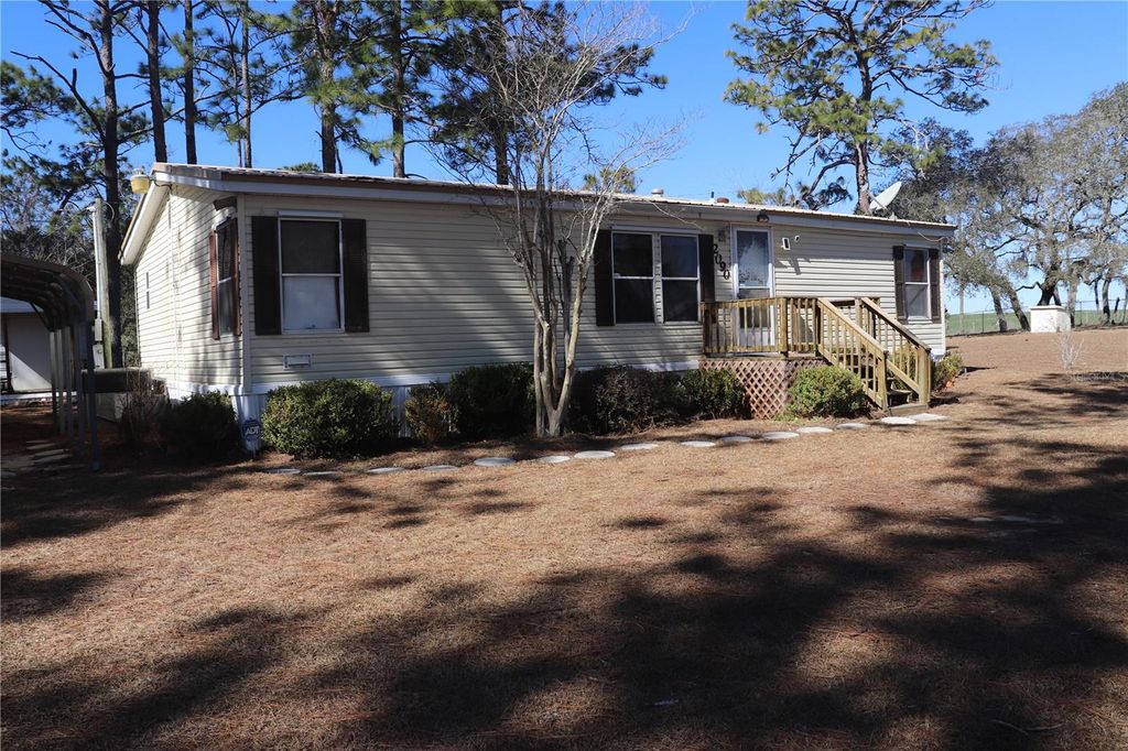 Photo of 2090 SE 133rd Court, Morriston, FL 32668 (MLS # OM716114)