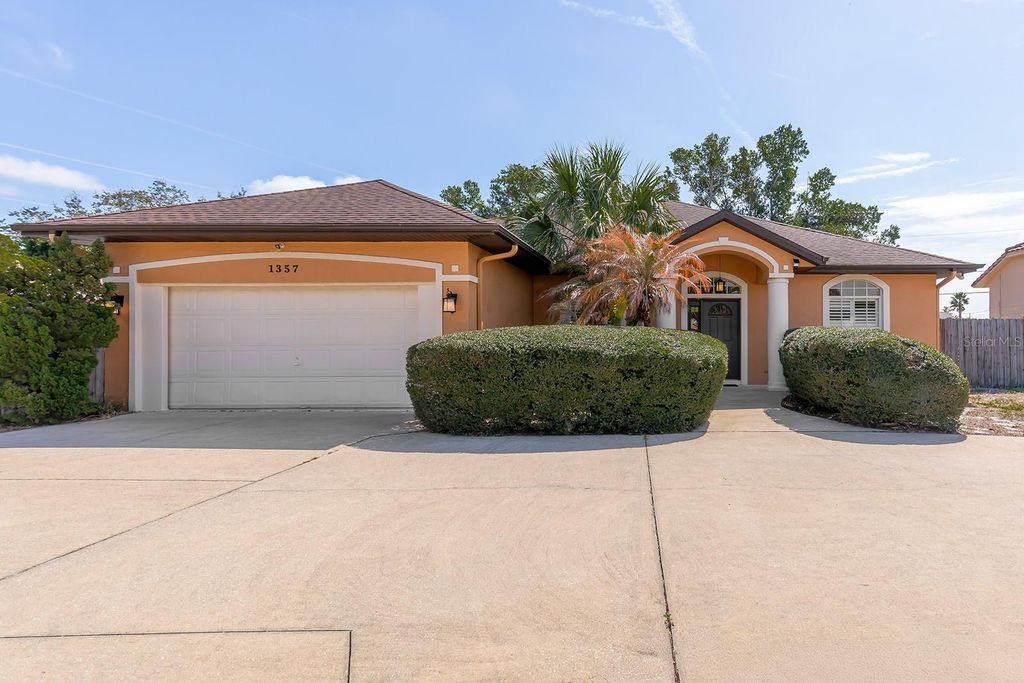 Photo of 1357 Providence Boulevard, Deltona, FL 32725 (MLS # O6386623)