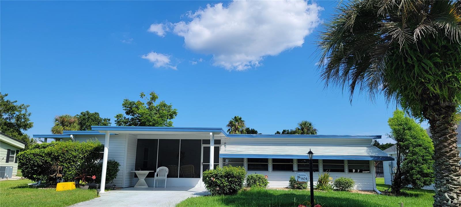 Home located in the historic district of The Villages. Close to hospital, drs offices, shopping, Spanish Springs town square. Golf course with restaurant nearby. Recreation center and pool around the corner. Golf cart on over to Walmart or BJ's club. 2 bedroom 1 and a half bath home with a large Florida room under air and a rear screened lanai. New waterproof vinyl flooring in the bathrooms, hall and kitchen. New A/C. There is a covered area for your golf cart or bicycles.