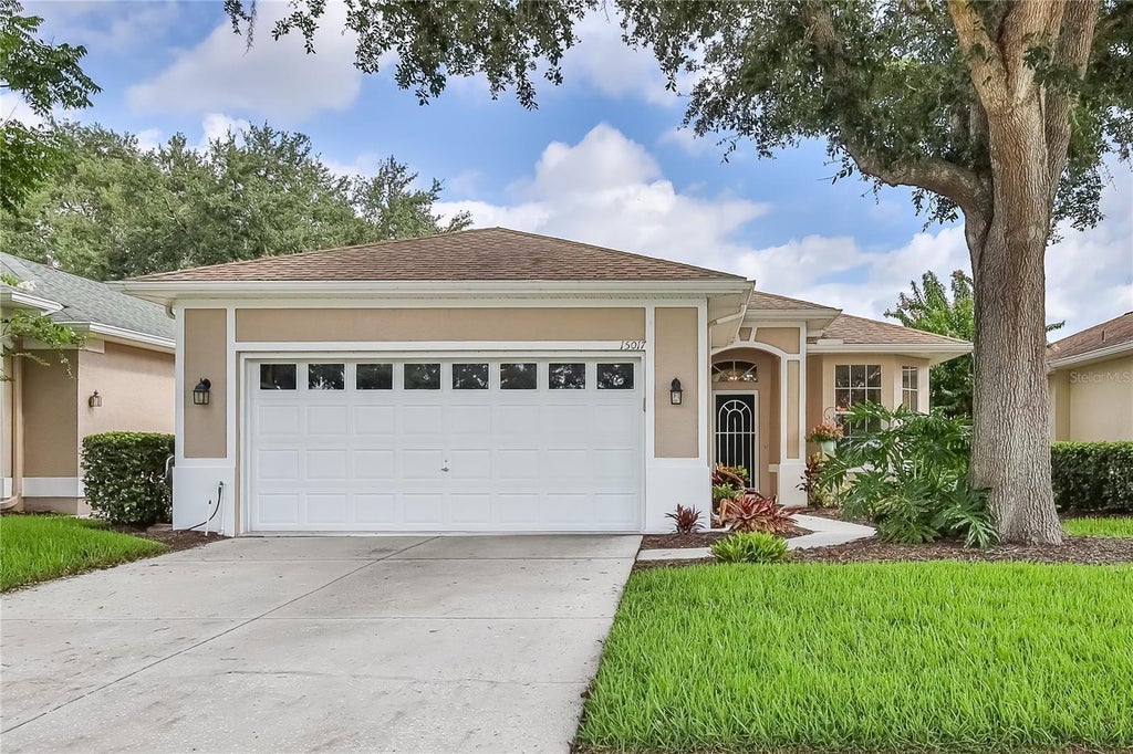 Photo of 15017 Tamarind Loop, Spring Hill, FL 34609 (MLS # W7890385)