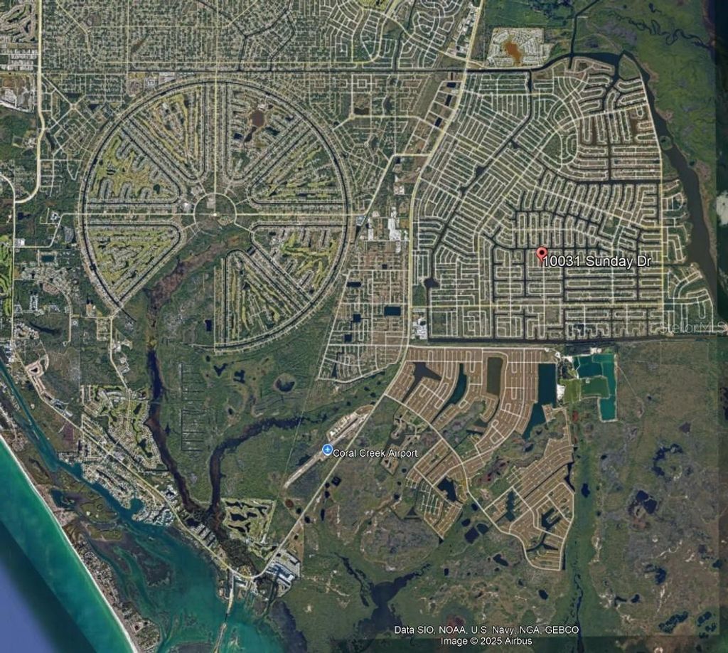 Photo of 10031 Sunday Drive, Port Charlotte, FL 33981 (MLS # TB8398072)