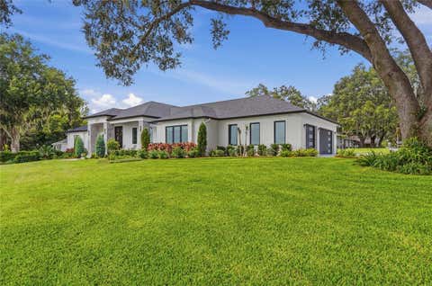 Photo of 1307 N Lake Howard Drive, Winter Haven, FL 33881 (MLS # L4964325)