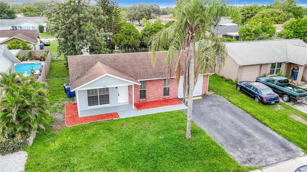 Photo of 7400 Mitchell Ranch Road, New Port Richey, FL 34655 (MLS # O6416493)