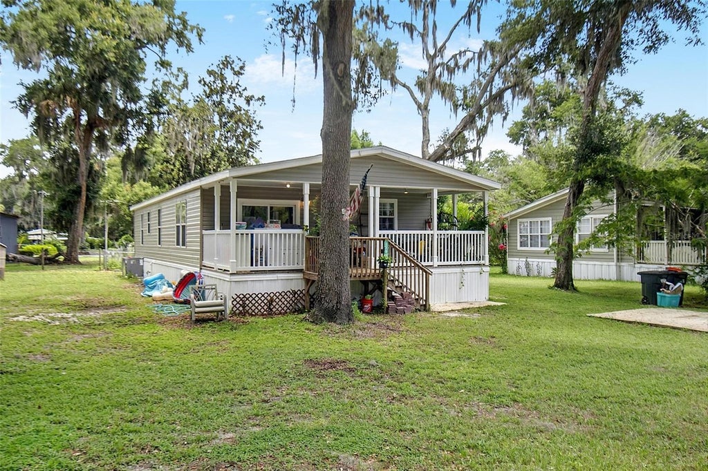 Photo of 123 Magnolia Drive, Satsuma, FL 32189 (MLS # FC320195)