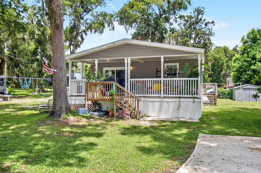 Photo of 123 Magnolia Drive, Satsuma, FL 32189 (MLS # FC320195)