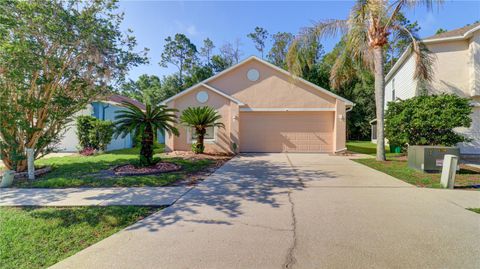 Photo of 30316 Double Drive, Wesley Chapel, FL 33545 (MLS # TB8511163)