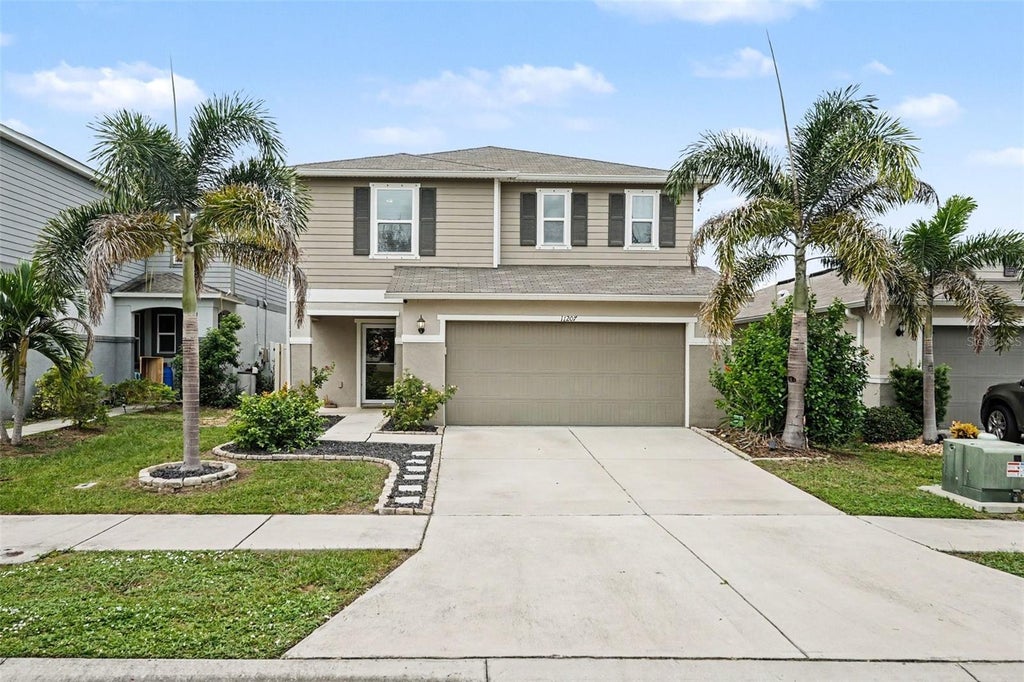 Photo of 11207 Southern Cross Place, Gibsonton, FL 33534 (MLS # O6447363)