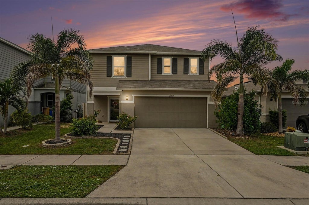 Photo of 11207 Southern Cross Place, Gibsonton, FL 33534 (MLS # O6447363)