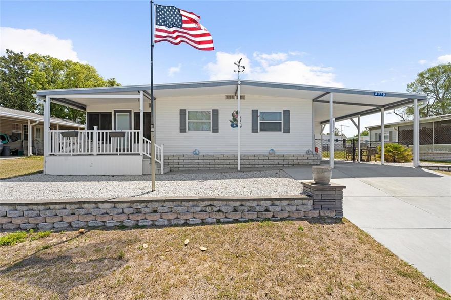 Enjoy easy, affordable living in this charming 2-bedroom, 2-bath mobile home located in a desirable 55+ retirement community. This well-maintained home is beautifully decorated and comes mostly furnished—just bring your personal touches, as the living room sofa and recliner are not included.

One of the standout features is the bright and inviting 11x15 sunroom, offering the perfect space to relax with your morning coffee, set up a cozy sitting area, or even create a small home office or hobby space. With abundant natural light and peaceful backyard views, it truly extends your living area and enhances the Florida lifestyle.

Additional upgrades provide peace of mind, including a rubber roof with a lifetime warranty and a hall bathroom updated by Bath Fitter, also backed by a lifetime warranty.

The low HOA of only 46 monthly gives you access to fantastic amenities, including a welcoming clubhouse, a large community pool, and a variety of social activities to keep you as active and engaged as you'd like.

Whether you're looking for a seasonal getaway or a full-time residence, this move-in-ready home offers comfort, convenience, and a vibrant community lifestyle.