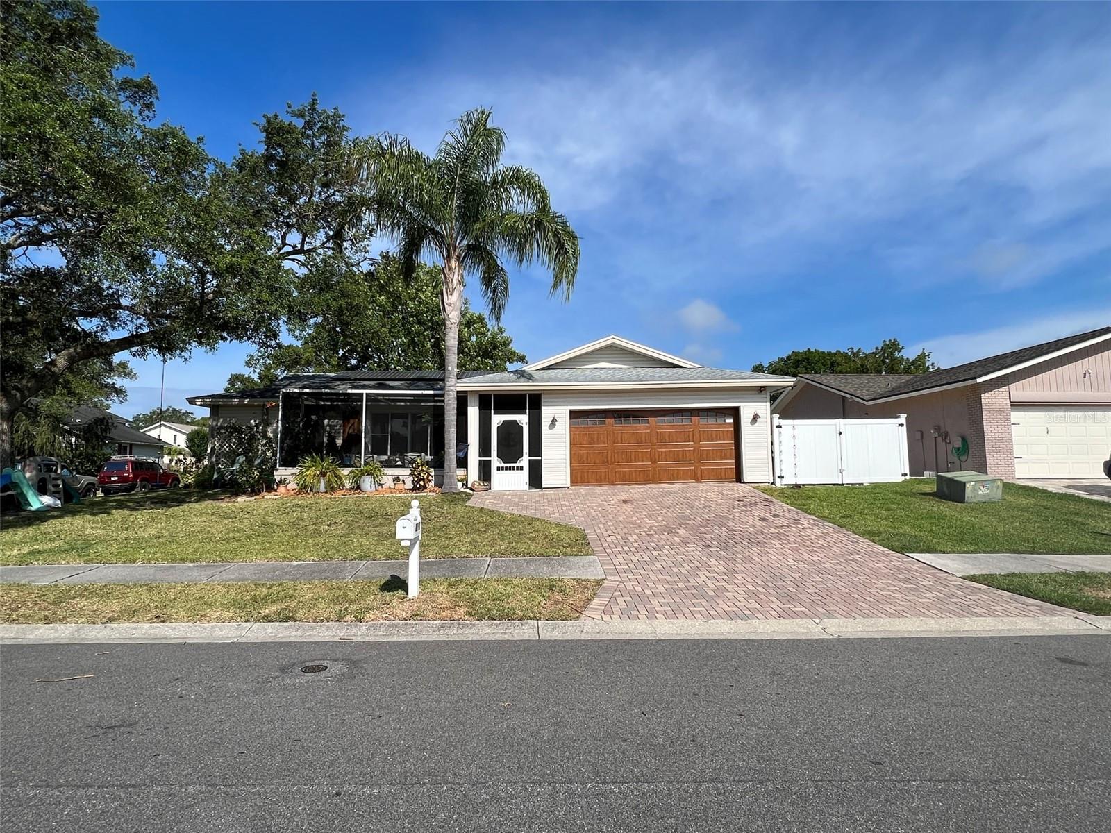 This beautiful home has so much to offer. The location alone makes it an ideal home for families or anyone who likes to be close to it all. Only a 10–15-minute bike ride to all the best of Safety Harbor including downtown. You can walk down the block to North City Park or a mile to Phillippe Park on the water. A 20-minute drive to Tampa, Honeymoon Beach and St. Pete make is a very central commute. The home itself has so much to offer as well as a 3/2 split floor plan. The Master bedroom has a nice walk-in closet, its own en suite bathroom and additional space perfect for an office, sitting room or attached nursery. The other two bedrooms are spacious as well. The back bedroom offering its own exit into the lanai and two full size closets. Most of the house has been remodeled with fresh paint, new flooring throughout the house, added details with a built-in bookshelf and custom pantry sliding door, new bathrooms, kitchen remodeled with more cabinetry and new butcher block countertops perfect for your bar height stools. In the backyard the pool welcomes you to enjoy the Florida life, a fun play area, new vinyl fence, pavers for your outdoor living space and even a raised garden bed. This home is ready for you! Basic POOL and LAWN care INCLUDED! SOLAR PANELS help keep the Electric Bills low.