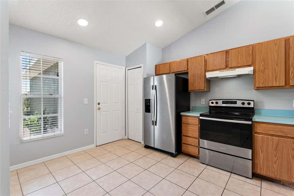 Photo of 128 Burgoyne Loop, Davenport, FL 33897 (MLS # O6414549)